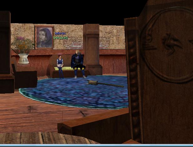 A son spying behind the table